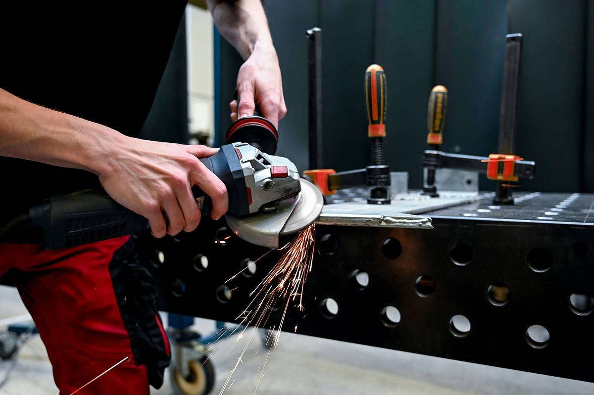 cnc plasma cutting projects showing intricate metal garden trellis being cut from sheet steel