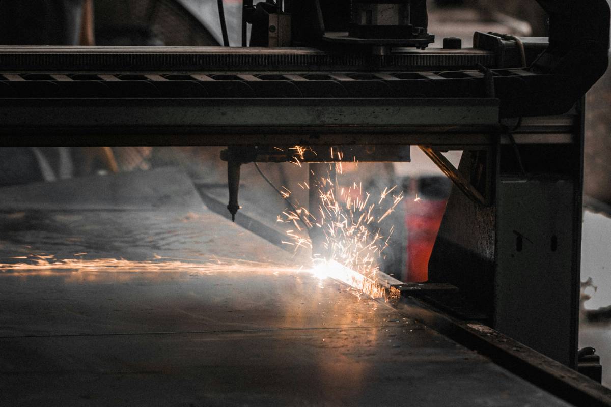 cnc plasma artwork tutorials showing a finished steel wall art piece with clean cuts and minimal dross