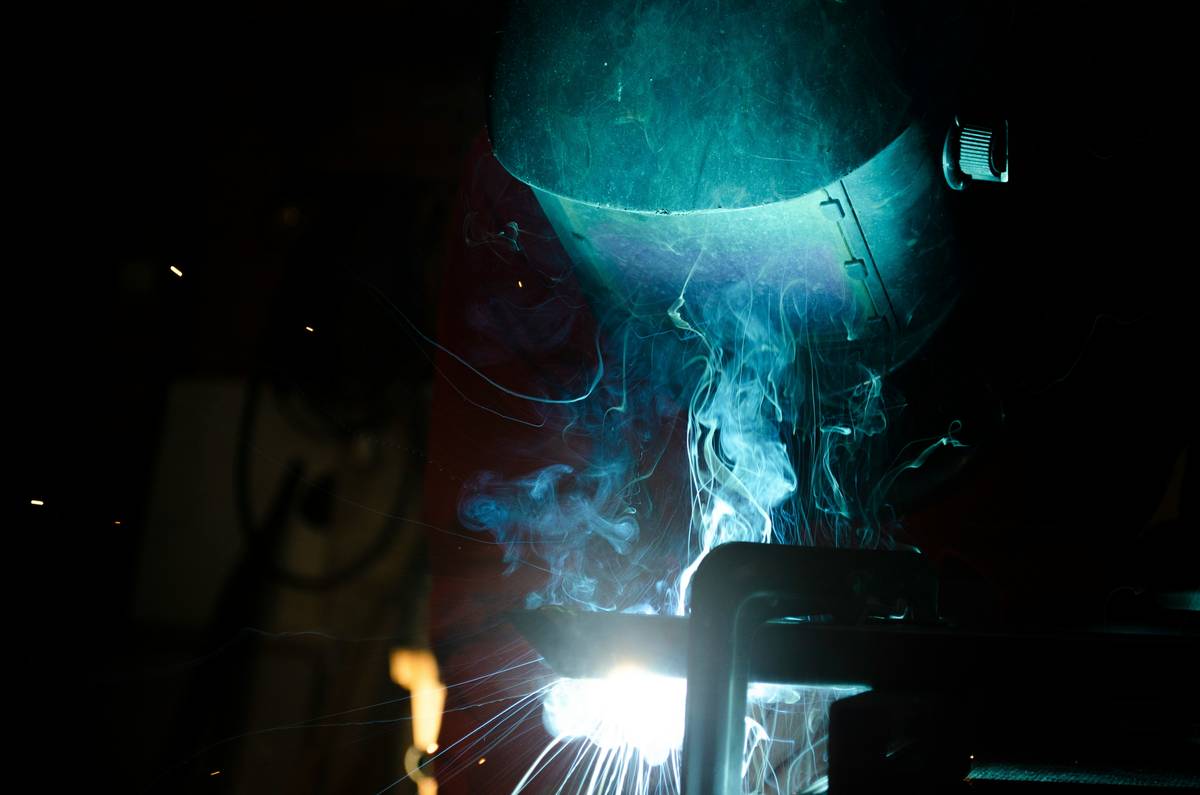 Yes welder with plasma cutter in action cutting through 1/4-inch steel plate with clean edge